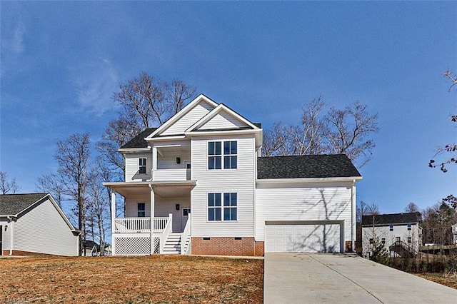 front of property with a garage and a porch