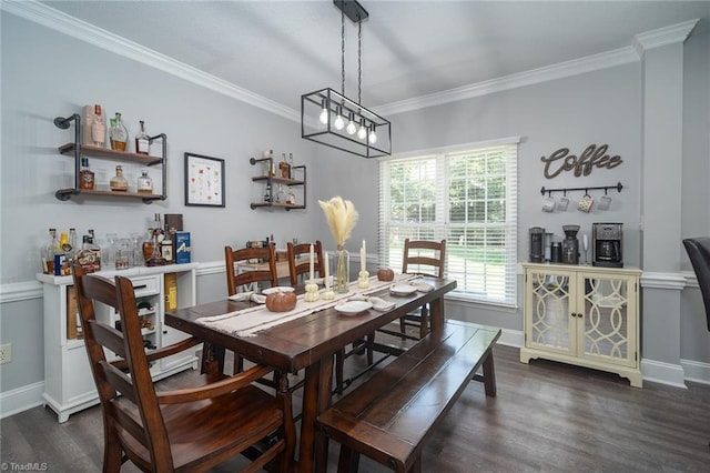 dining area with ornamental molding, a notable chandelier, and dark hardwood / wood-style flooring