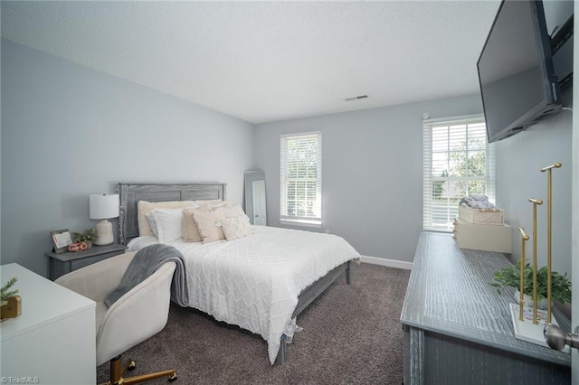 bedroom featuring carpet floors and multiple windows