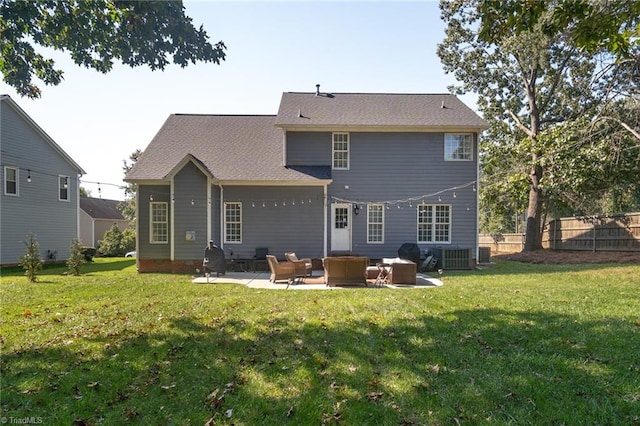 rear view of house featuring an outdoor hangout area, a patio, and a lawn