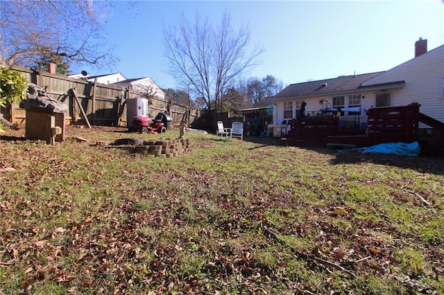 view of yard featuring a wooden deck