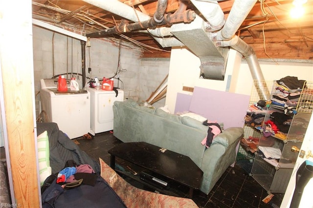 basement featuring washing machine and clothes dryer