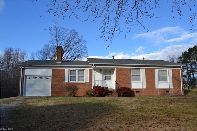 view of front facade featuring a front lawn and a garage