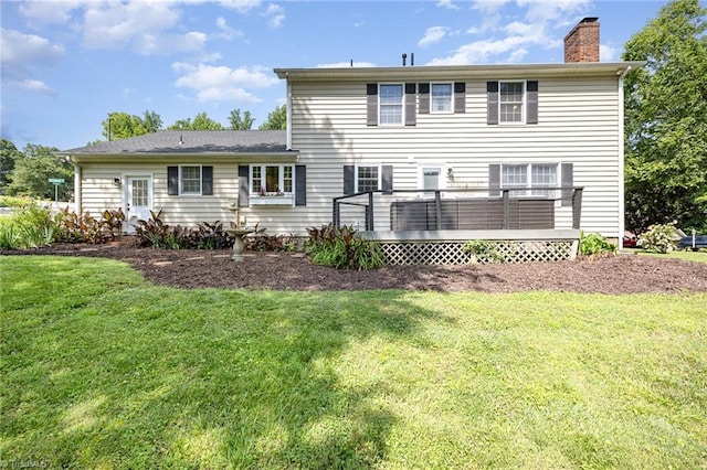1101 Shalimar Ct, High Point, NC 27262 - rear view of house with a chimney, a lawn, and a deck