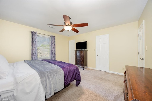 1101 Shalimar Ct, High Point, NC 27262 - bedroom with baseboards, light colored carpet, and ceiling fan