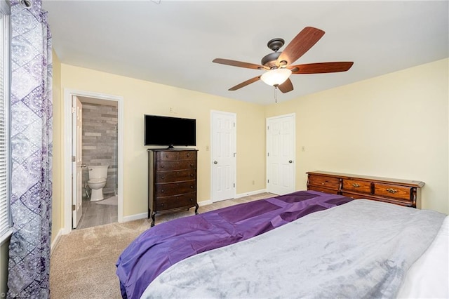 1101 Shalimar Ct, High Point, NC 27262 - carpeted bedroom featuring baseboards, a ceiling fan, and connected bathroom