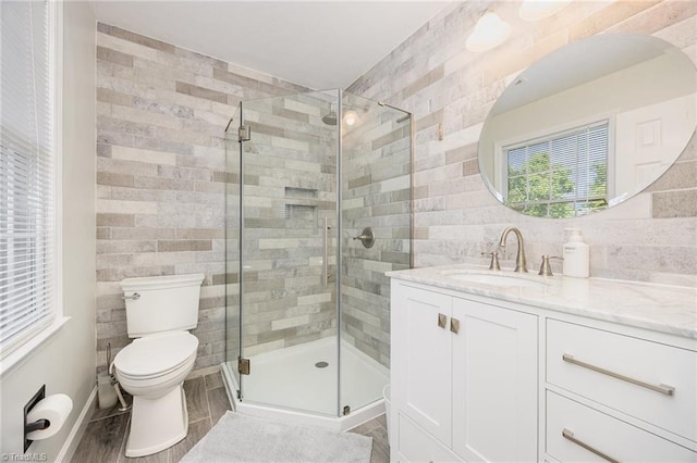 1101 Shalimar Ct, High Point, NC 27262 - full bathroom with tile walls, a shower stall, vanity, toilet, and wood finished floors