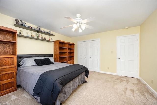 1101 Shalimar Ct, High Point, NC 27262 - bedroom with a closet, light colored carpet, baseboards, and ceiling fan