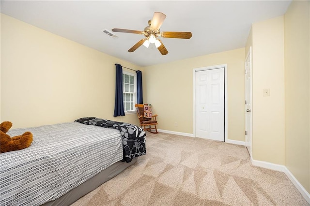 1101 Shalimar Ct, High Point, NC 27262 - carpeted bedroom with baseboards, ceiling fan, and a closet