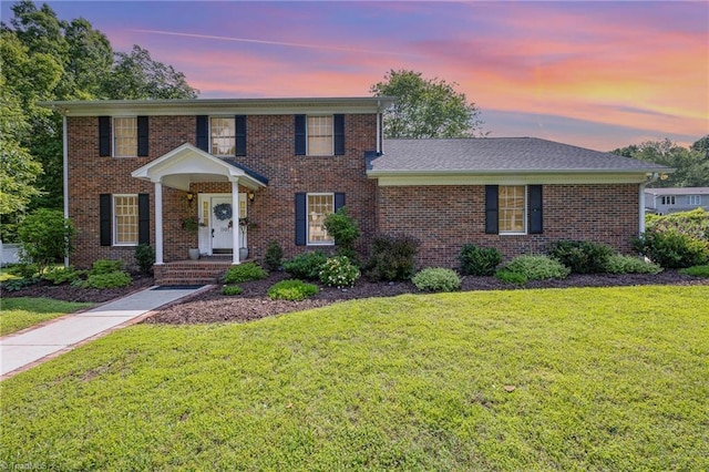 1101 Shalimar Ct, High Point, NC 27262 - view of front facade with a yard and brick siding