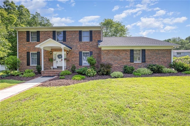 1101 Shalimar Ct, High Point, NC 27262 - view of front of property with a front yard and brick siding