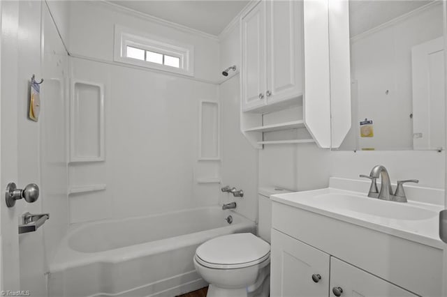 bathroom with toilet, ornamental molding, tub / shower combination, and vanity