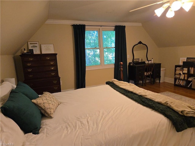 866 Trinity Church Rd, Tobaccoville, NC 27050 - bedroom featuring vaulted ceiling, wood finished floors, baseboards, ceiling fan, and ornamental molding