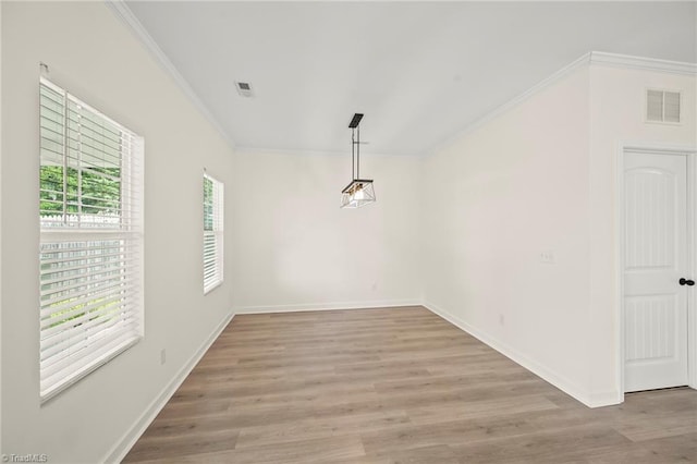 2109 Freeman St, Winston-Salem, NC 27127 - empty room with crown molding and light wood-style floors