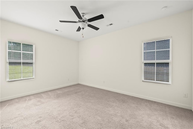 2109 Freeman St, Winston-Salem, NC 27127 - empty room featuring carpet floors, a ceiling fan, and a smoke detector