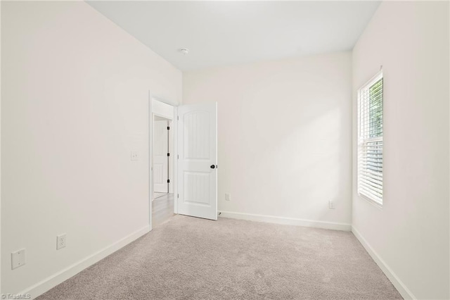 2109 Freeman St, Winston-Salem, NC 27127 - unfurnished room with light colored carpet and a smoke detector