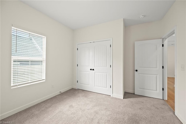 2109 Freeman St, Winston-Salem, NC 27127 - unfurnished bedroom with carpet flooring and a closet