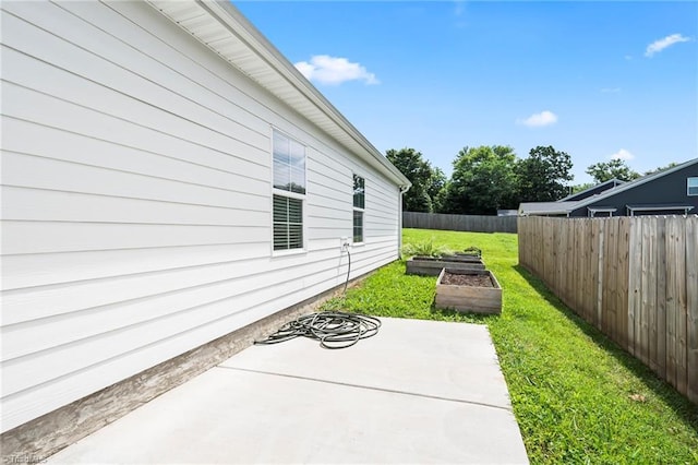 2109 Freeman St, Winston-Salem, NC 27127 - view of patio featuring a garden