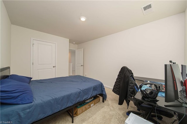 bedroom featuring carpet flooring and visible vents