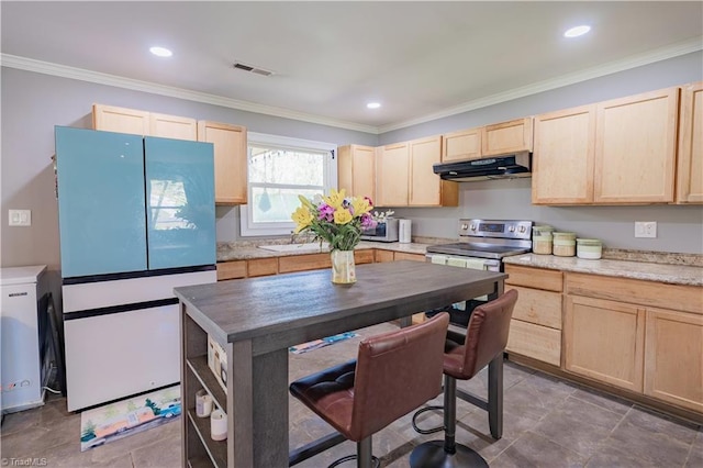 kitchen featuring visible vents, ornamental molding, light brown cabinets, under cabinet range hood, and appliances with stainless steel finishes