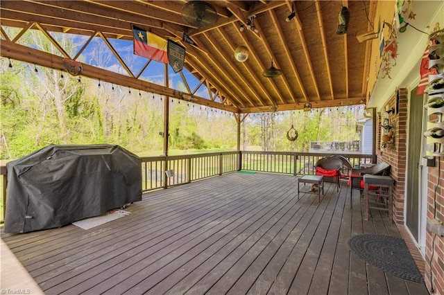 wooden deck with grilling area
