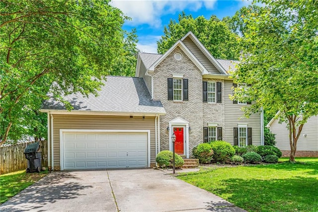 1515 Klompen Rd, Kernersville, NC 27284 - view of front of home featuring concrete driveway, an attached garage, and roof with shingles