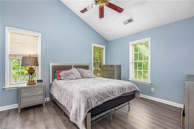 1515 Klompen Rd, Kernersville, NC 27284 - bedroom with wood finished floors, lofted ceiling, baseboards, and a ceiling fan