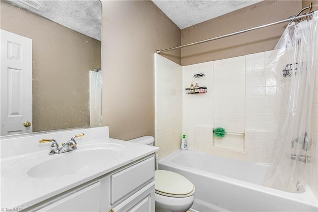 1515 Klompen Rd, Kernersville, NC 27284 - bathroom with toilet, shower / bath combo with shower curtain, vanity, and a textured ceiling