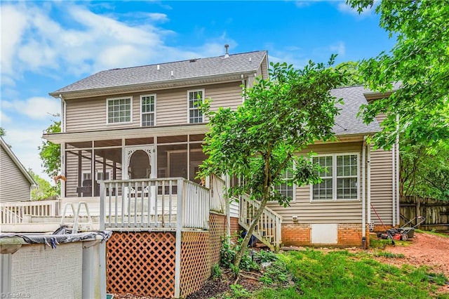 1515 Klompen Rd, Kernersville, NC 27284 - back of property featuring a sunroom and a shingled roof