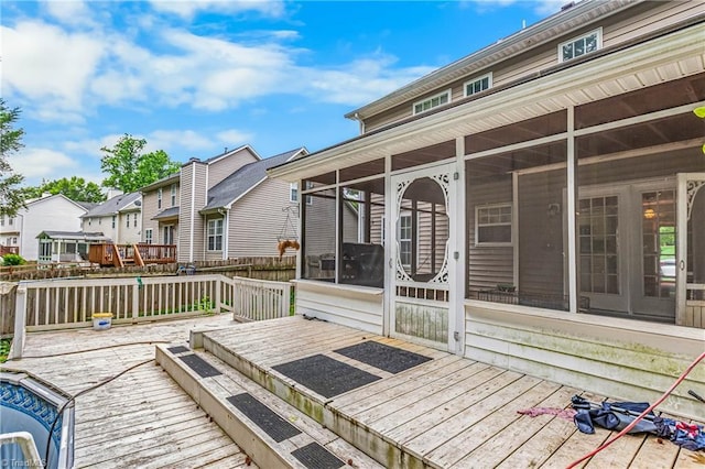 1515 Klompen Rd, Kernersville, NC 27284 - wooden deck featuring a sunroom and a residential view