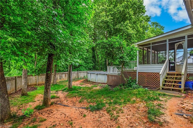 1515 Klompen Rd, Kernersville, NC 27284 - fenced backyard with a sunroom