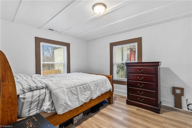 bedroom featuring light hardwood / wood-style floors