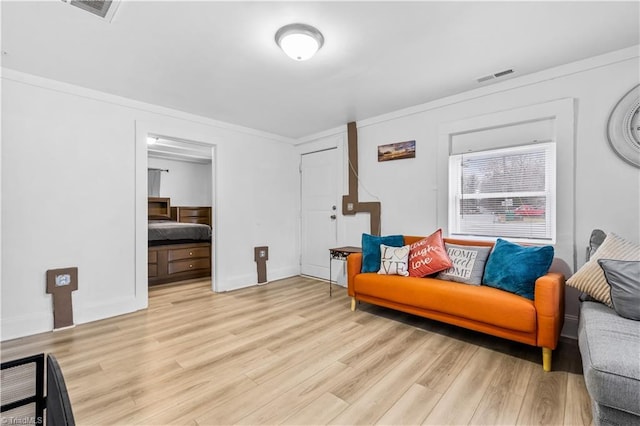 sitting room featuring light wood-type flooring