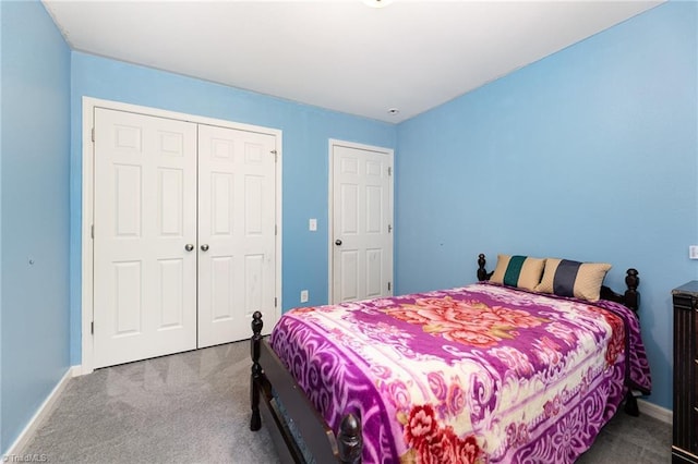 228 Timberwood Dr, High Point, NC 27260 - carpeted bedroom featuring a closet and baseboards