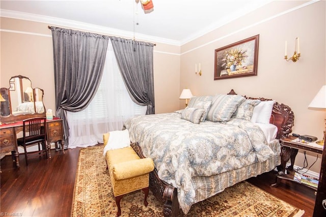 bedroom featuring ceiling fan, dark wood-type flooring, and ornamental molding