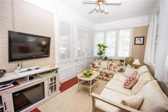 living room with hardwood / wood-style floors and ceiling fan