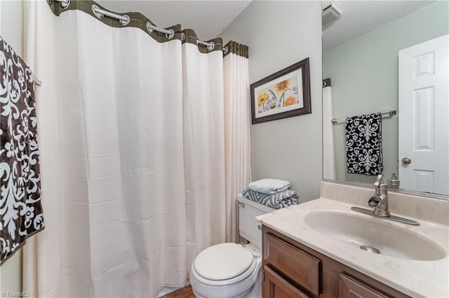 944 Chatfield Dr, Jamestown, NC 27282 - bathroom featuring a textured ceiling, vanity, and a shower with curtain