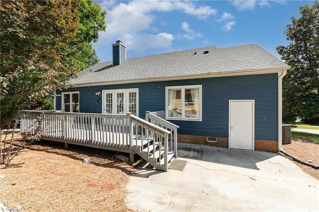 944 Chatfield Dr, Jamestown, NC 27282 - back of property with a chimney, a deck, a patio, crawl space, and a shingled roof