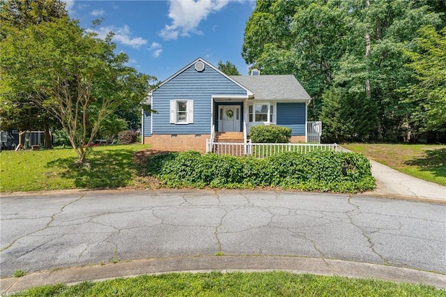 944 Chatfield Dr, Jamestown, NC 27282 - bungalow-style home with a front lawn and a chimney