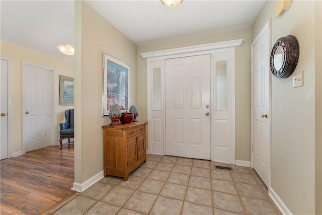 944 Chatfield Dr, Jamestown, NC 27282 - foyer featuring baseboards