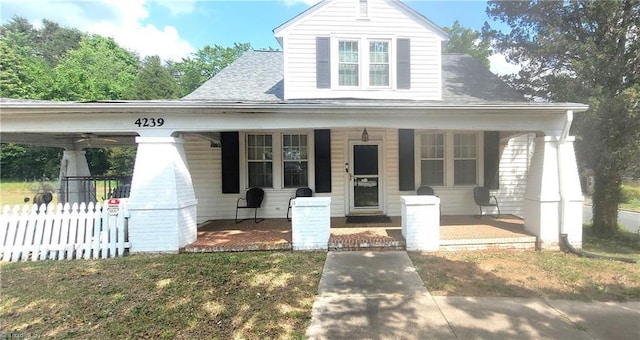 4239 Carver School Rd, Winston-Salem, NC 27105 - bungalow featuring a porch and a shingled roof