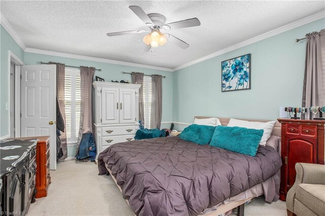 4104 Moss Brook Dr, Winston-Salem, NC 27127 - bedroom with light colored carpet, crown molding, a ceiling fan, and a textured ceiling