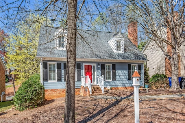 4104 Moss Brook Dr, Winston-Salem, NC 27127 - cape cod home with a chimney and roof with shingles
