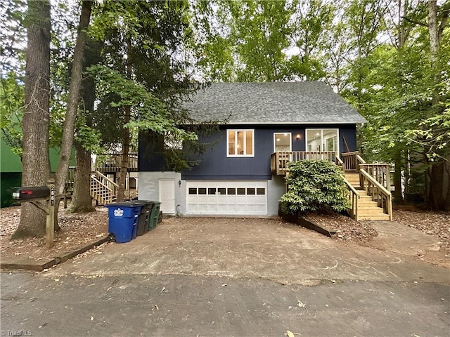 view of front of property with a garage