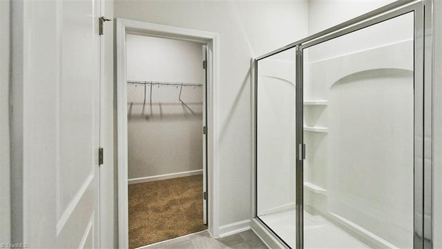 bathroom with an enclosed shower