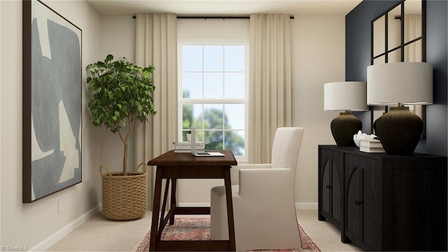 sitting room featuring baseboards, a wealth of natural light, and light colored carpet