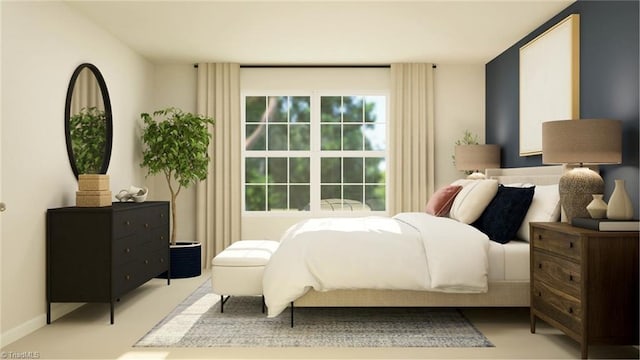 bedroom featuring light colored carpet and baseboards