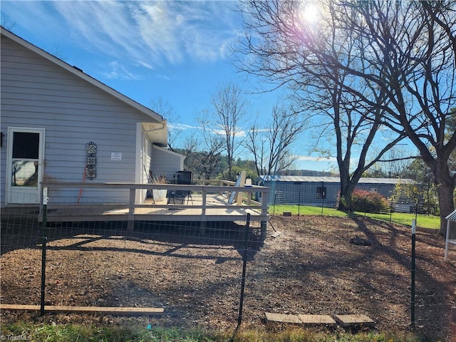 view of yard with a deck