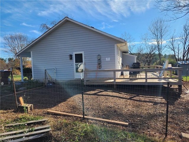 view of home's exterior featuring a deck