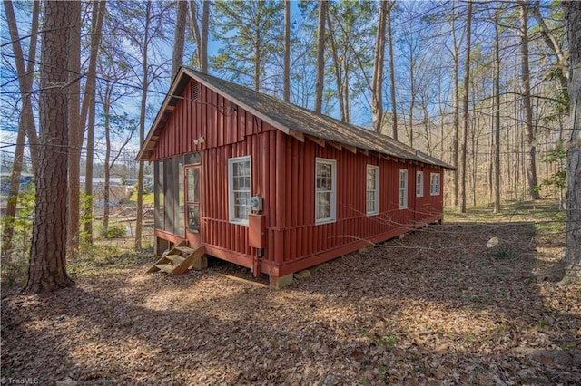 view of property exterior with board and batten siding